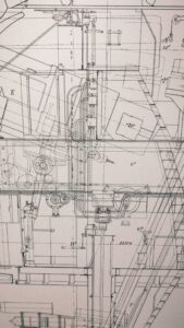 Close-up view of a detailed architectural blueprint showing precise construction plans.